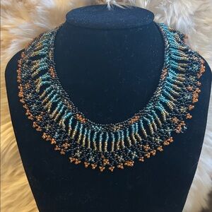 Elegant Beaded Necklace in Blue, Gold, and Orange